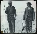 Image of Swan and Loon Held by Two Eskimos [Inuit] of Baffin Land